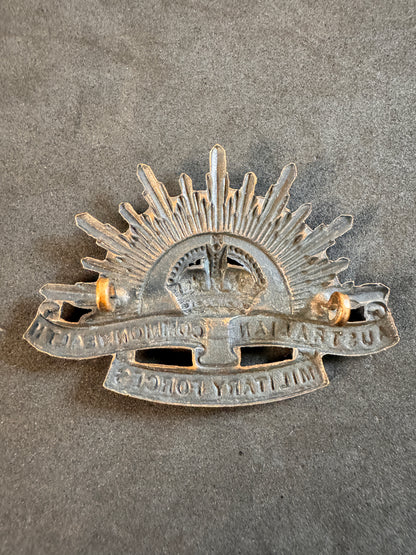 Image of product: australian commonwealth military forces rising sun cap badge