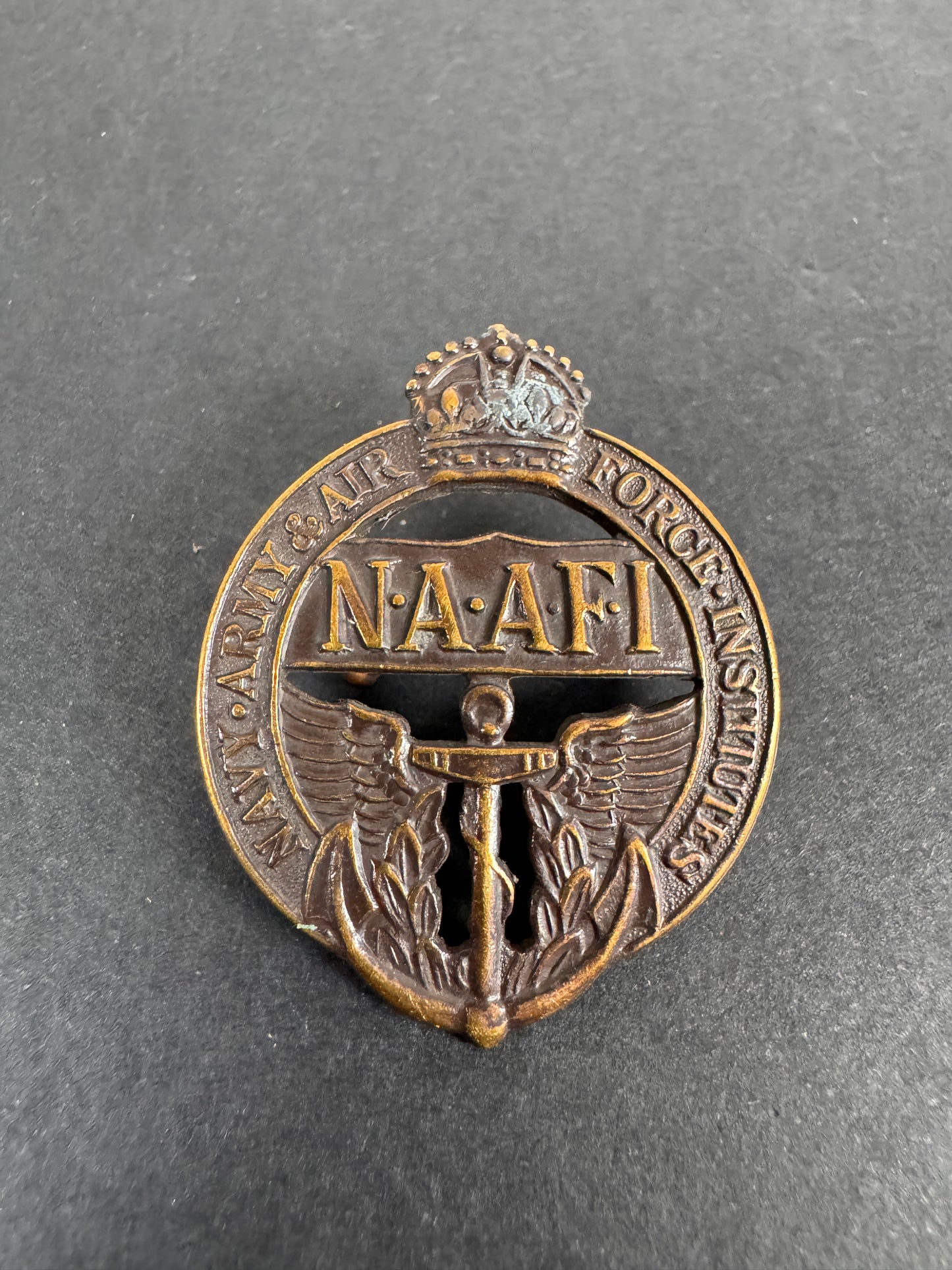 Image of WW2 British Navy Army Air Force Institute (NAAFI) Cap Badge