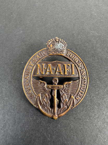 Image of WW2 British Navy Army Air Force Institute (NAAFI) Cap Badge
