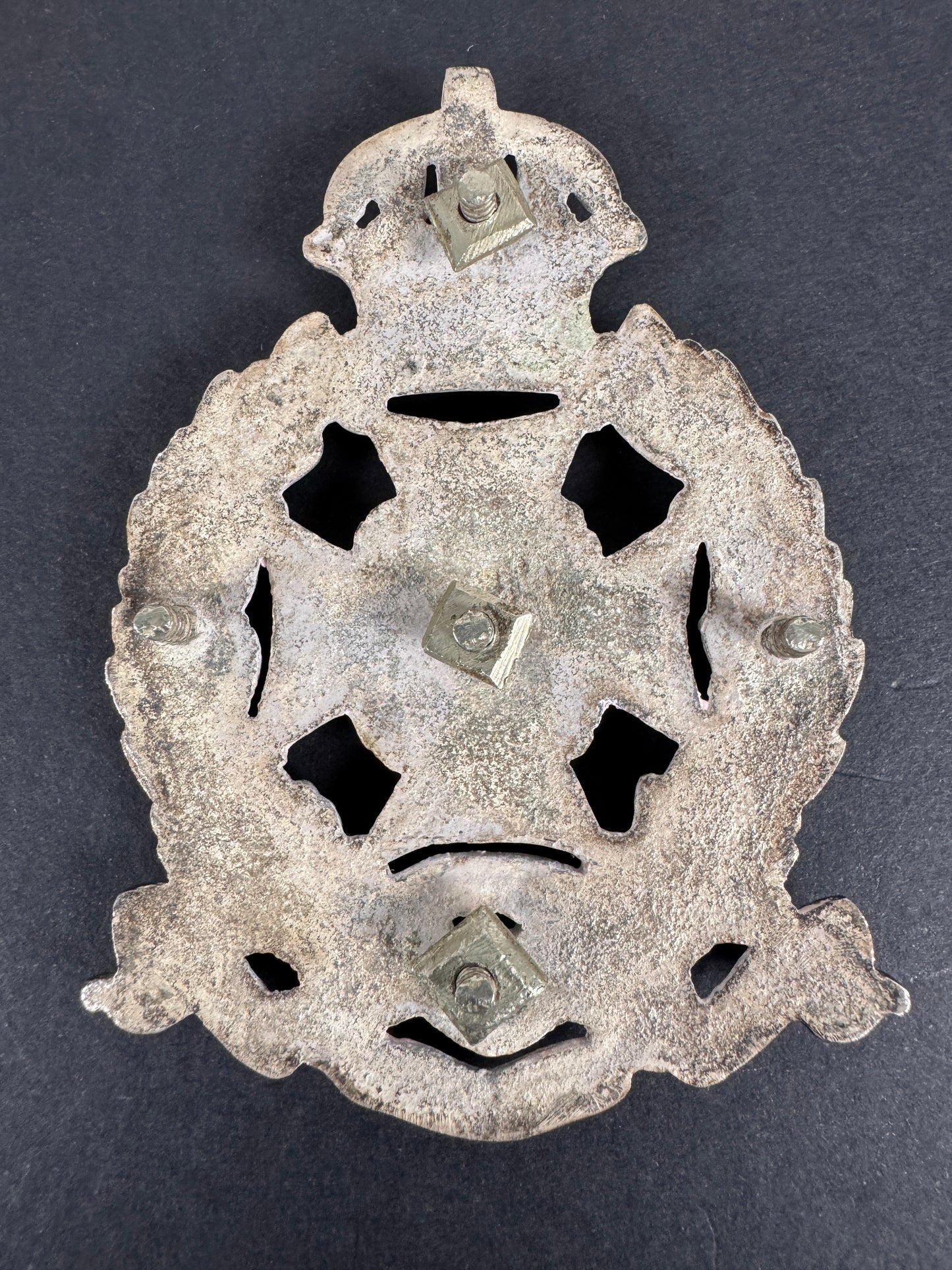 Image of product: british indian army naini tal volunteer rifles cross belt badge