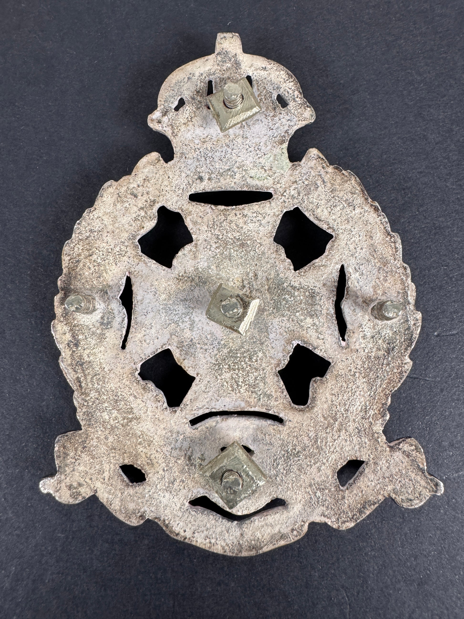 Image of product: british indian army naini tal volunteer rifles cross belt badge