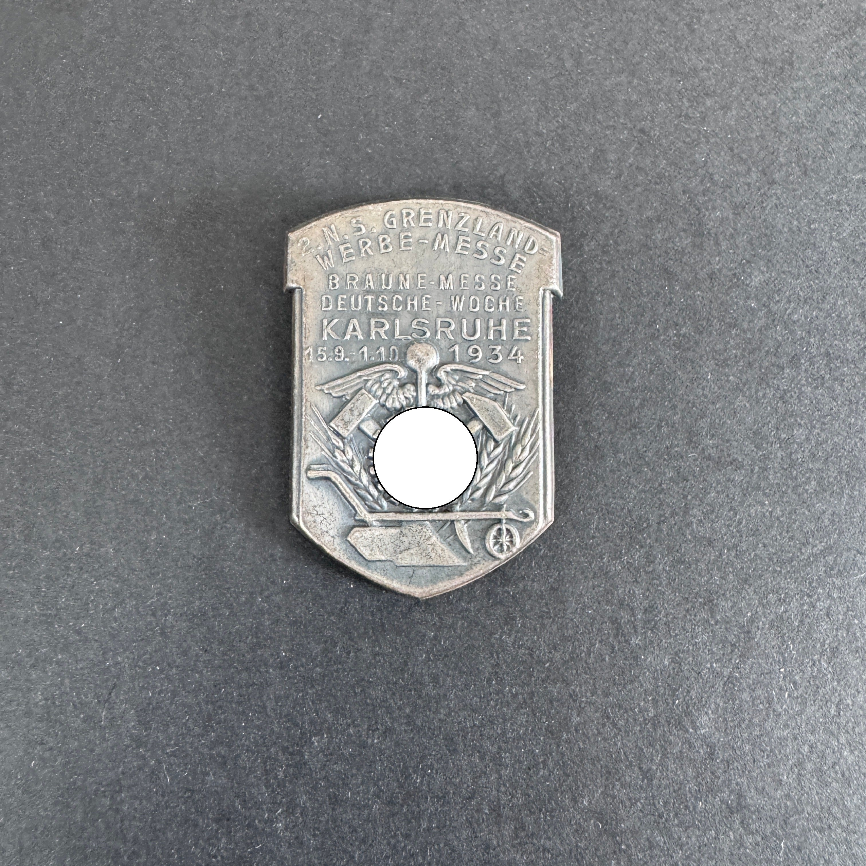Third Reich 2nd N.S. Werbe Messe Karlsruhe 1934 Tinnie Badge – Medals