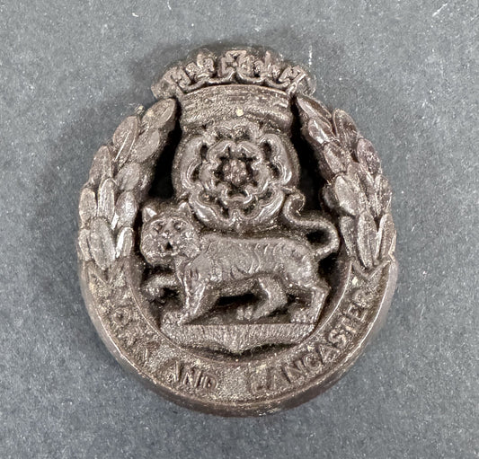 WW2 British Army York and Lancaster Regiment Economy Plastic Cap Badge