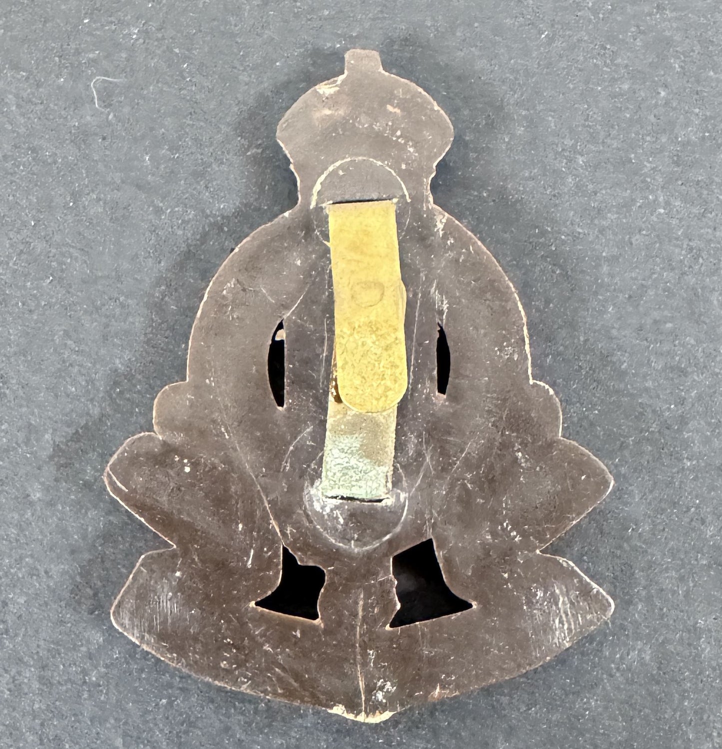 WW2 British Royal Army Ordnance Corps (RAOC) Economy Plastic Cap Badge