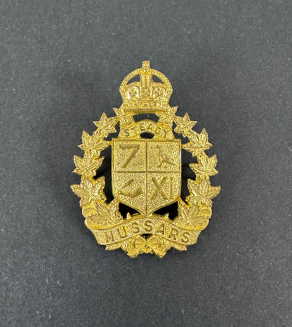 WW2 Canadian Army 7th/11th Hussars Officer's Gilt Cap Badge – An original and very scarce officer's cap badge of the 7th /...