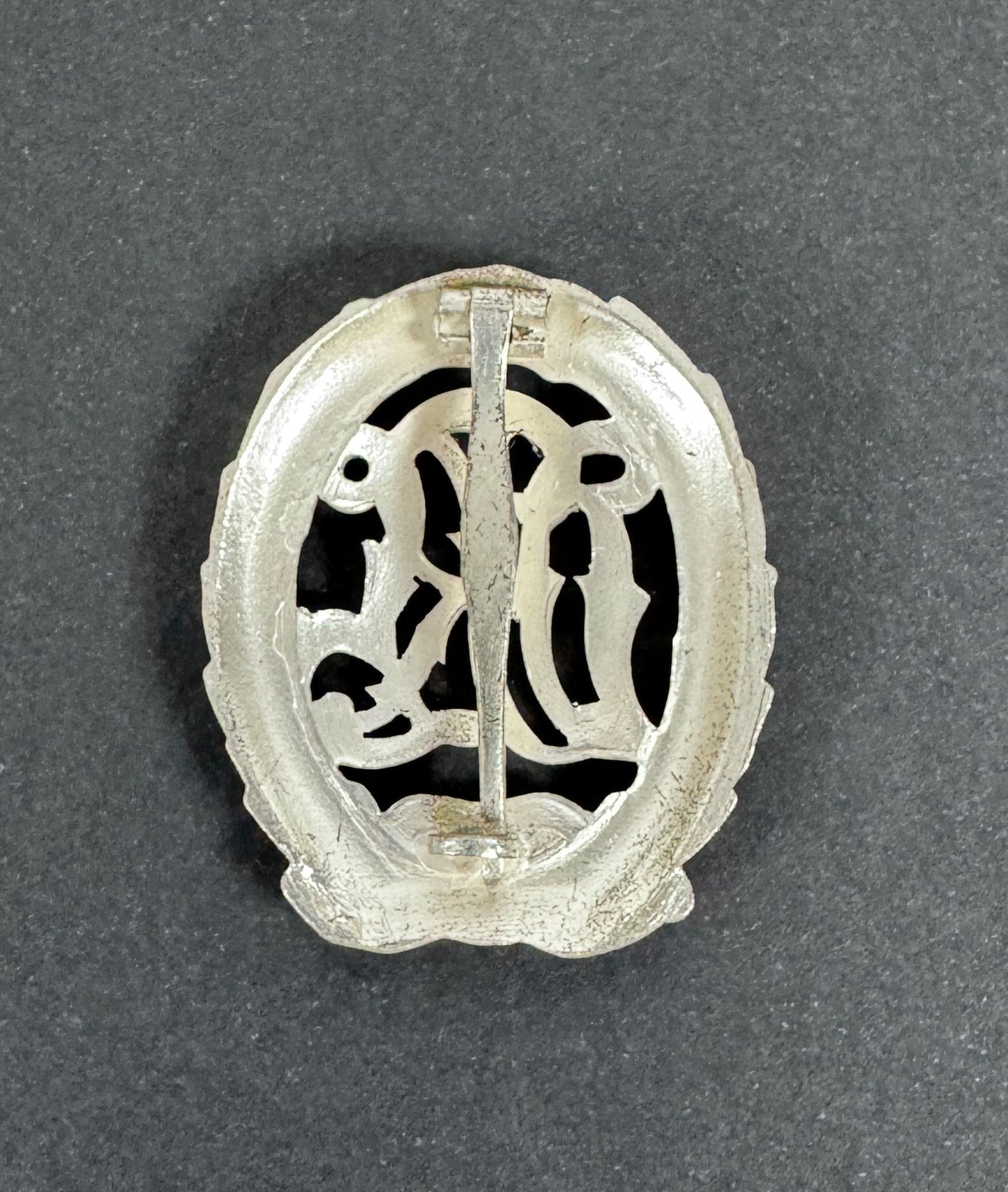 WW2 German DRL Sports Badge Silver Grade 1957 Version – An original DRL Sports Badge, silver grade. 1957 official state re...