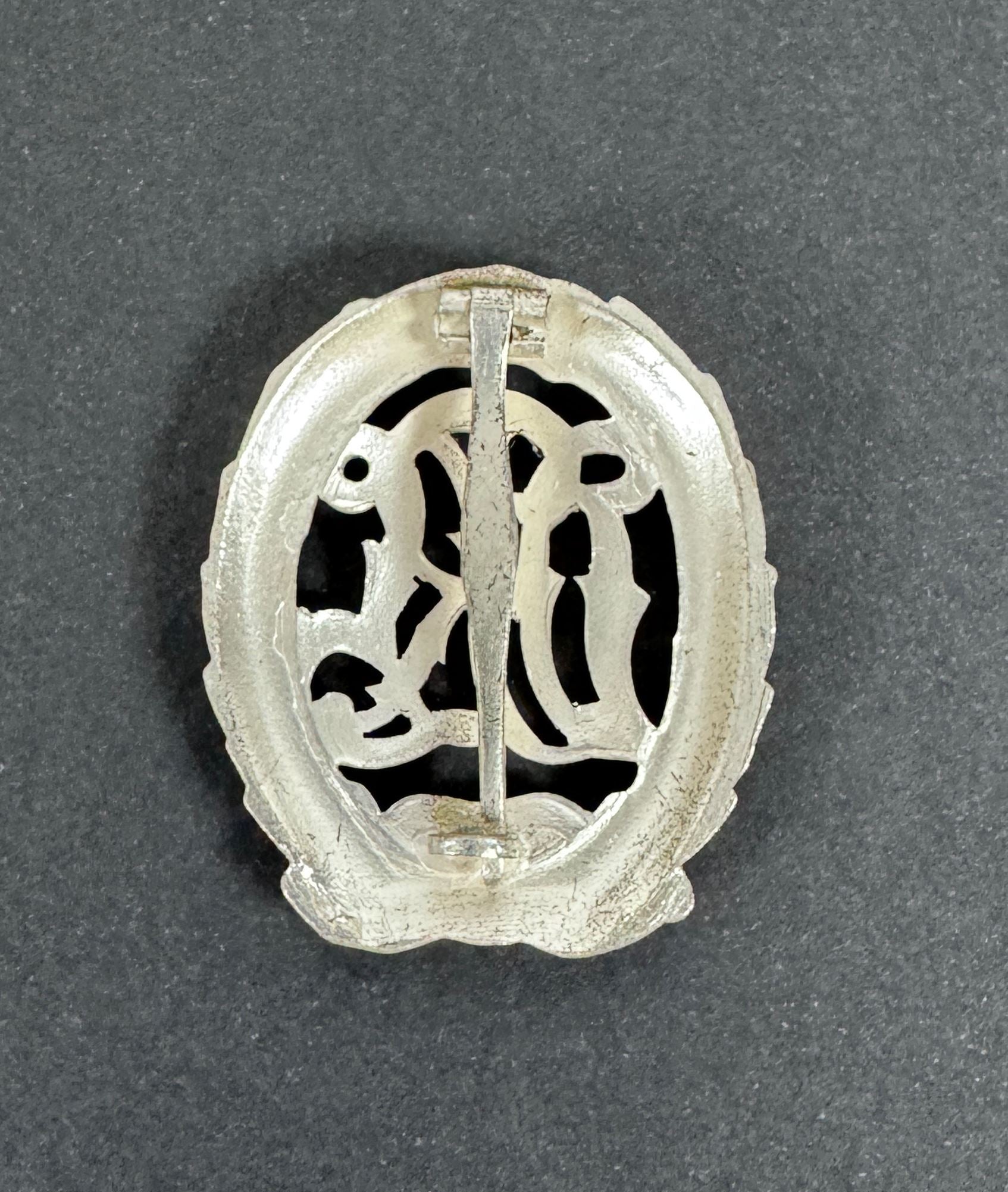 WW2 German DRL Sports Badge Silver Grade 1957 Version – An original DRL Sports Badge, silver grade. 1957 official state re...