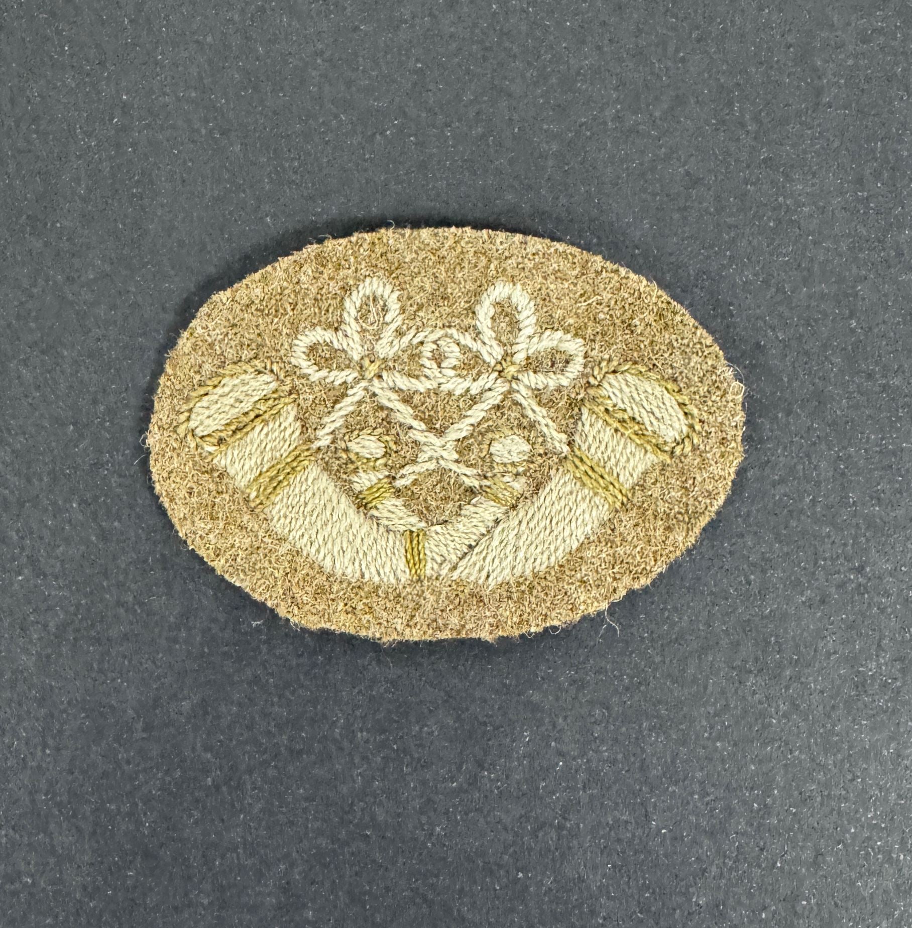 WW1 British Army Bugles Crossed Cloth Proficiency Arm Badge – An original and scarce trade proficiency cloth arm badge of...