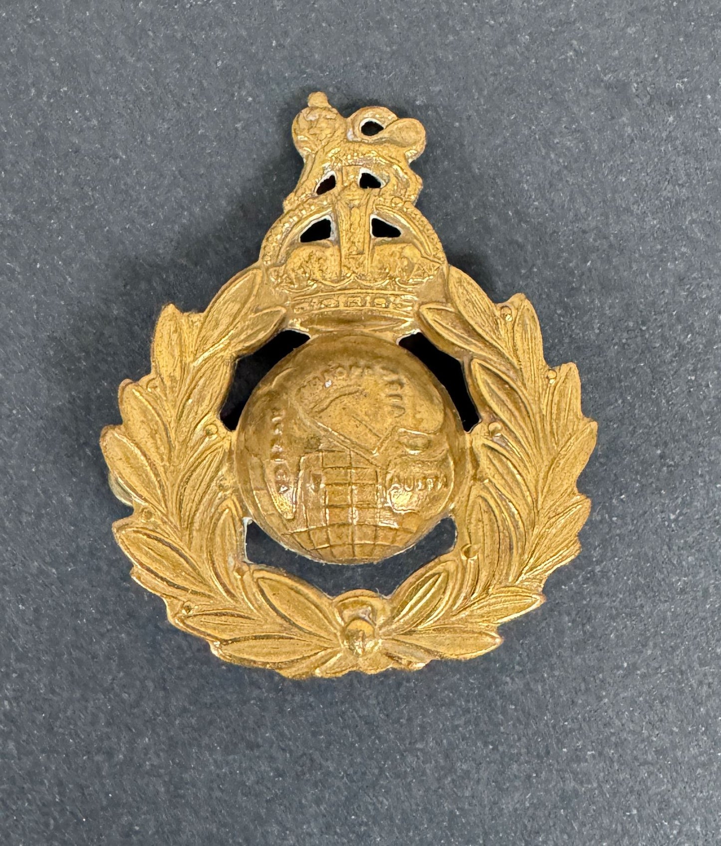 Royal Marines Cap Badge WW2 British – An original other ranks cap badge of The Royal Marines (R.M.). 40 x 48