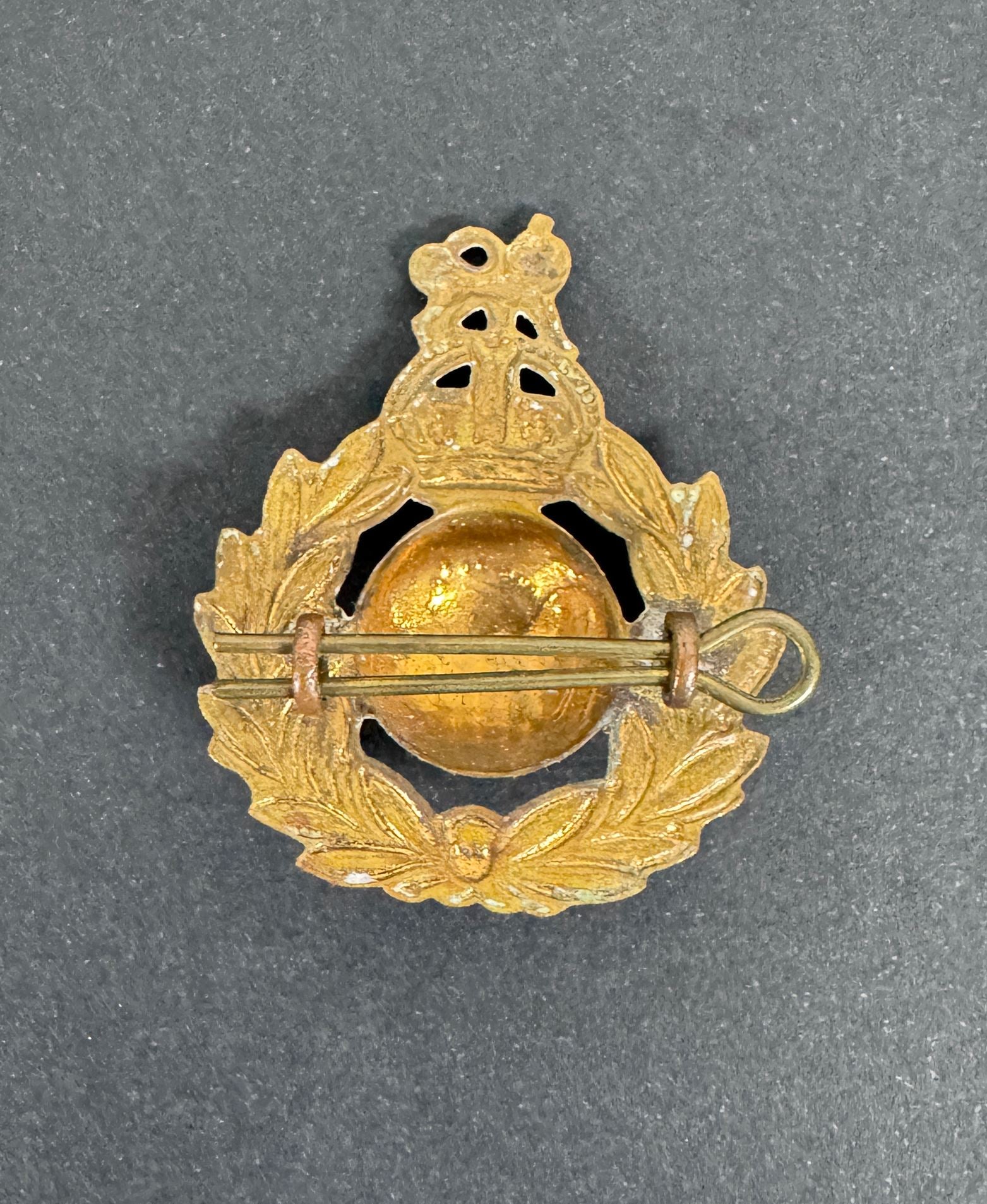 Royal Marines Cap Badge WW2 British – An original other ranks cap badge of The Royal Marines (R.M.). 40 x 48