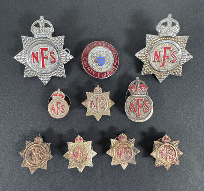 WW2 British Civil Defence AFS NFS Fire Service Cap Badges & Lapel Badges – A collection of cap badges and lapel membership...