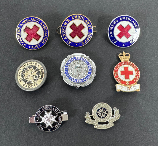 WW2 British Red Cross, St Johns Ambulance, Nursing Lapel Pin Cap Badges VAD – A collection of lapel badges of some of the...