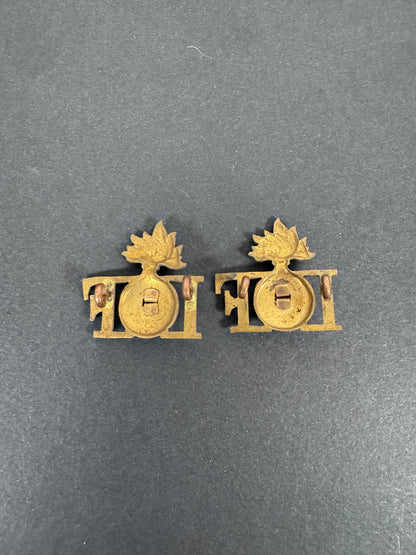 WW2 British Army Irish Fusiliers Shoulder Title Badges (Pair) – A matching pair of original uniform shoulder titles of the...