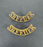 British Army Suffolk Regiment Shoulder Title Badges (Pair) – A matching pair of original uniform shoulder titles of the Su...