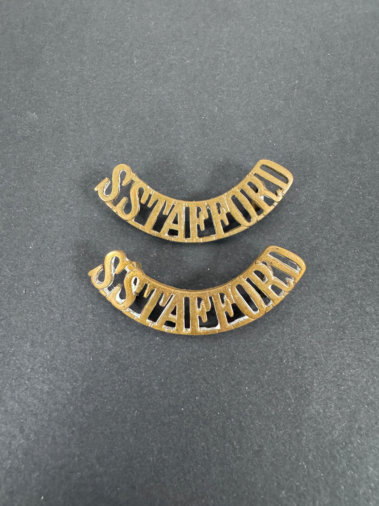 British Army South Staffordshire Regiment Shoulder Title Badges (Pair) – A matching pair of original uniform shoulder titl...