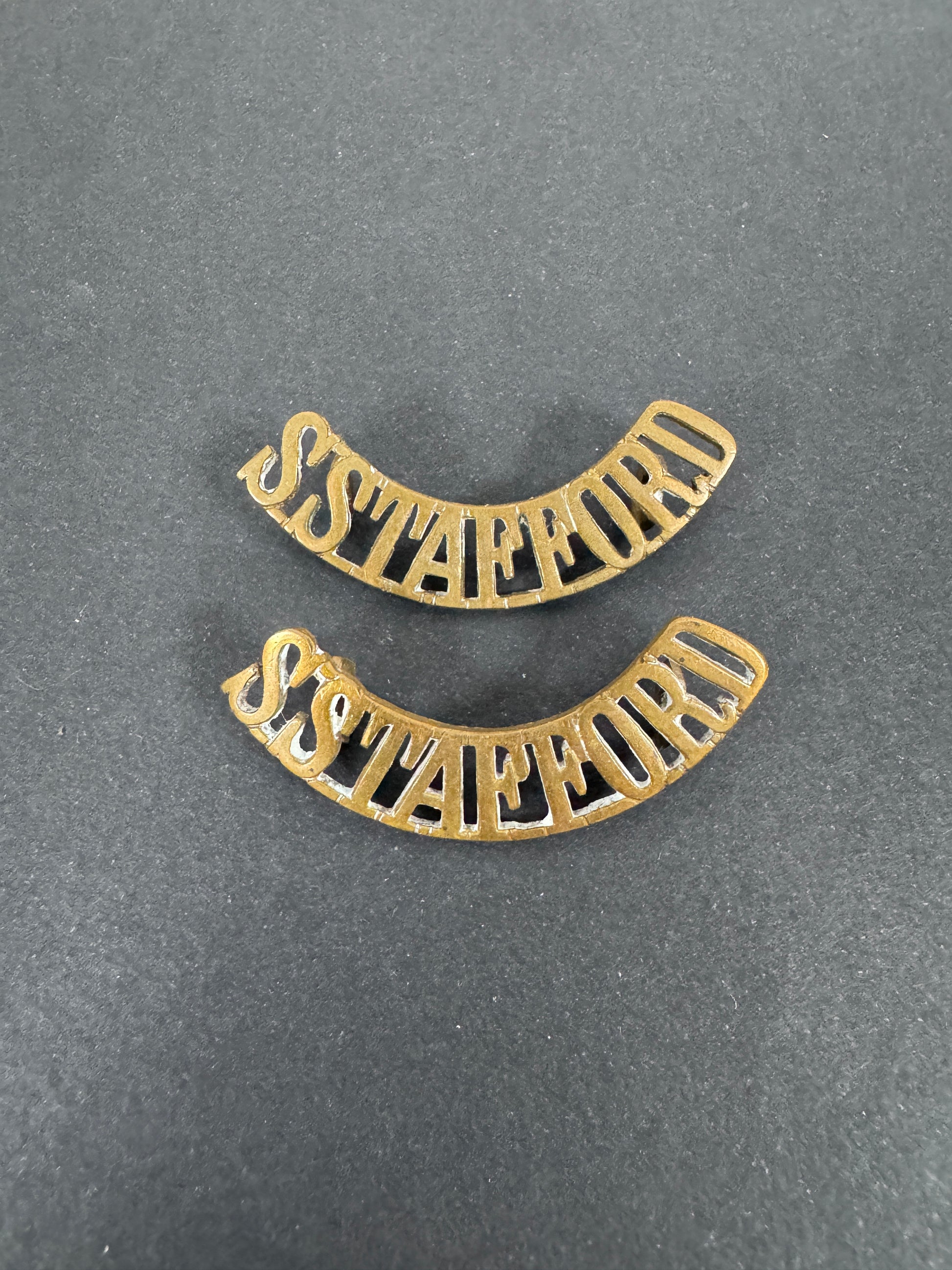 British Army South Staffordshire Regiment Shoulder Title Badges (Pair) – A matching pair of original uniform shoulder titl...