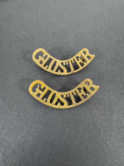 British Army Gloucestershire (GLOSTER) Regiment Shoulder Title Badges (Pair) – A matching pair of original uniform shoulde...