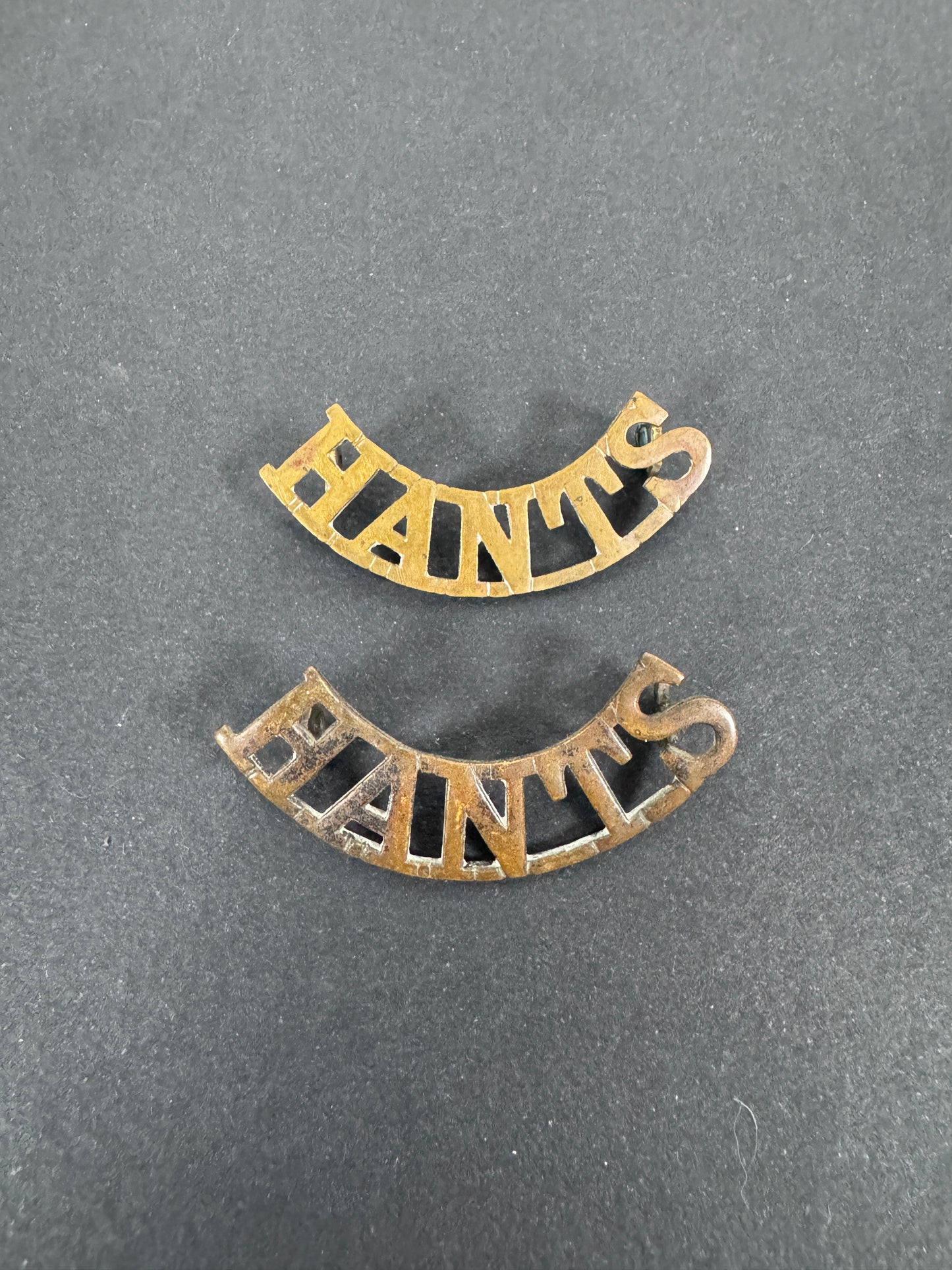 British Army Hampshire Regiment (HANTS) Shoulder Title Badges (Pair) – A matching pair of original uniform shoulder titles...