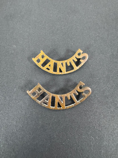 British Army Hampshire Regiment (HANTS) Shoulder Title Badges (Pair) – A matching pair of original uniform shoulder titles...