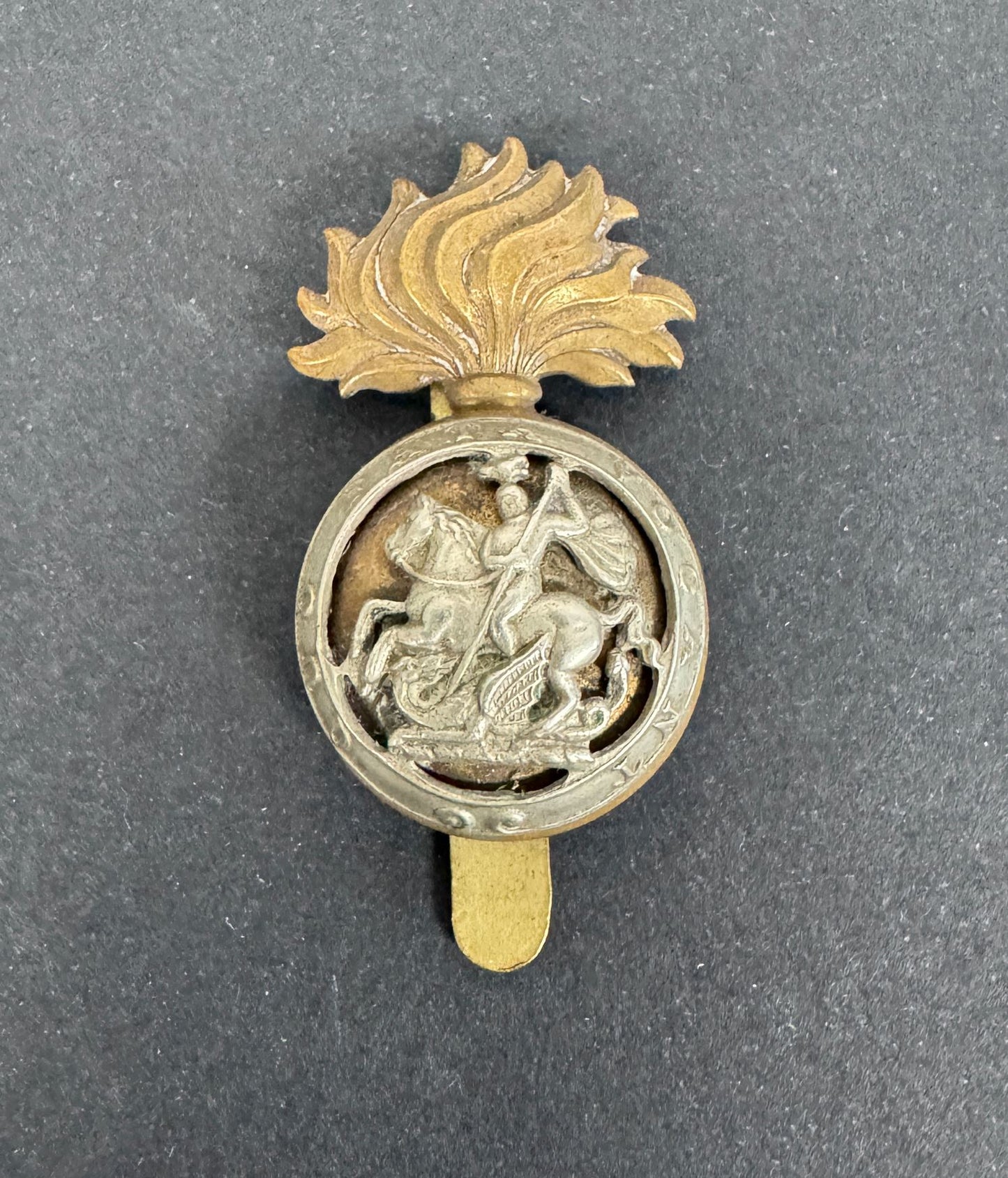 WW2 British Army Northumberland Fusiliers Cap Badge