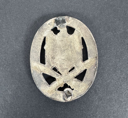 German general assault badge combat award. reverse image showing the pin mount missing.