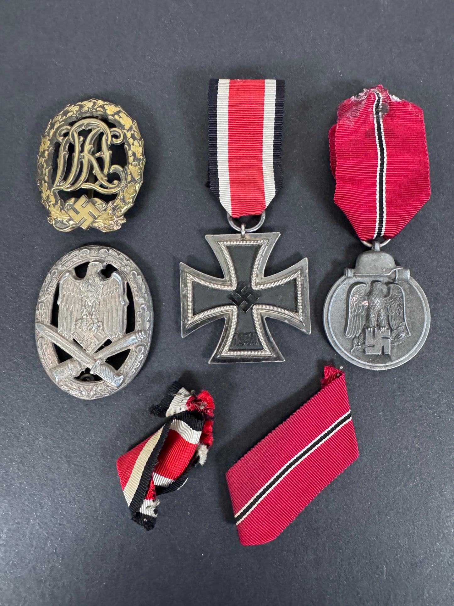A collection of german awards of a combat assault trooper.