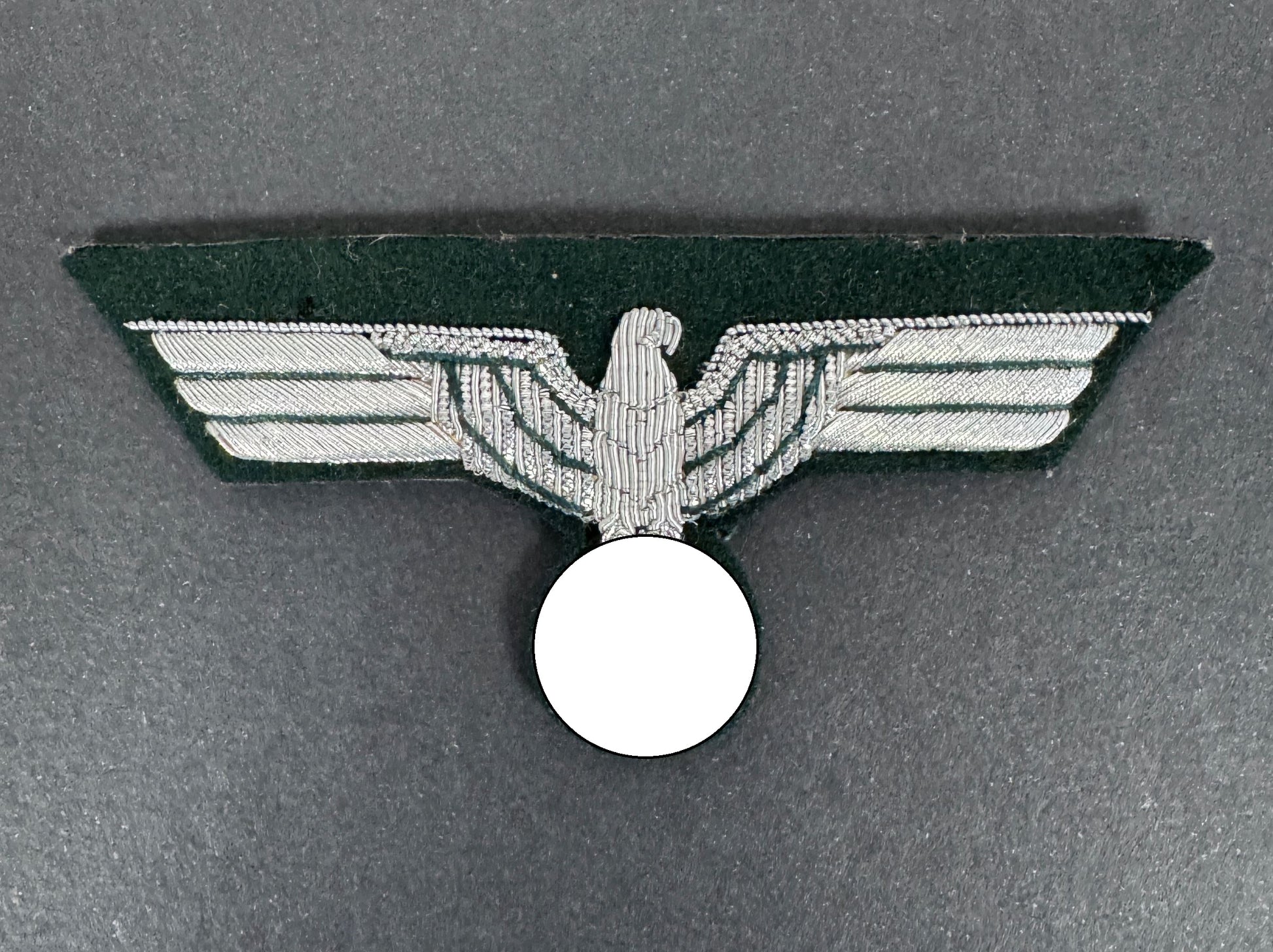 german army Eagle emblem on a gray background. political emblem blanked out.