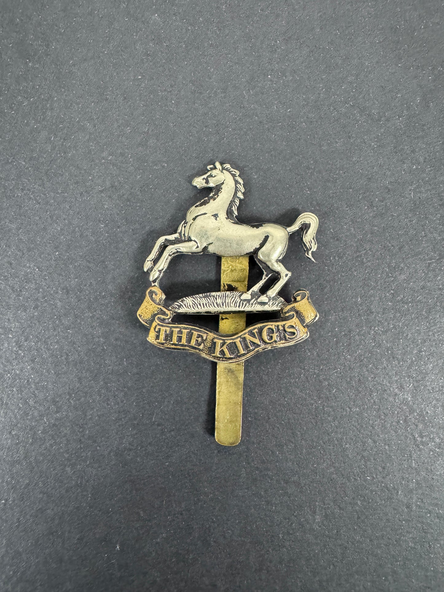 WW1 British Army King's Liverpool Regiment Blackened Cap Badge – An original other ranks forage cap badge of The King's Li...