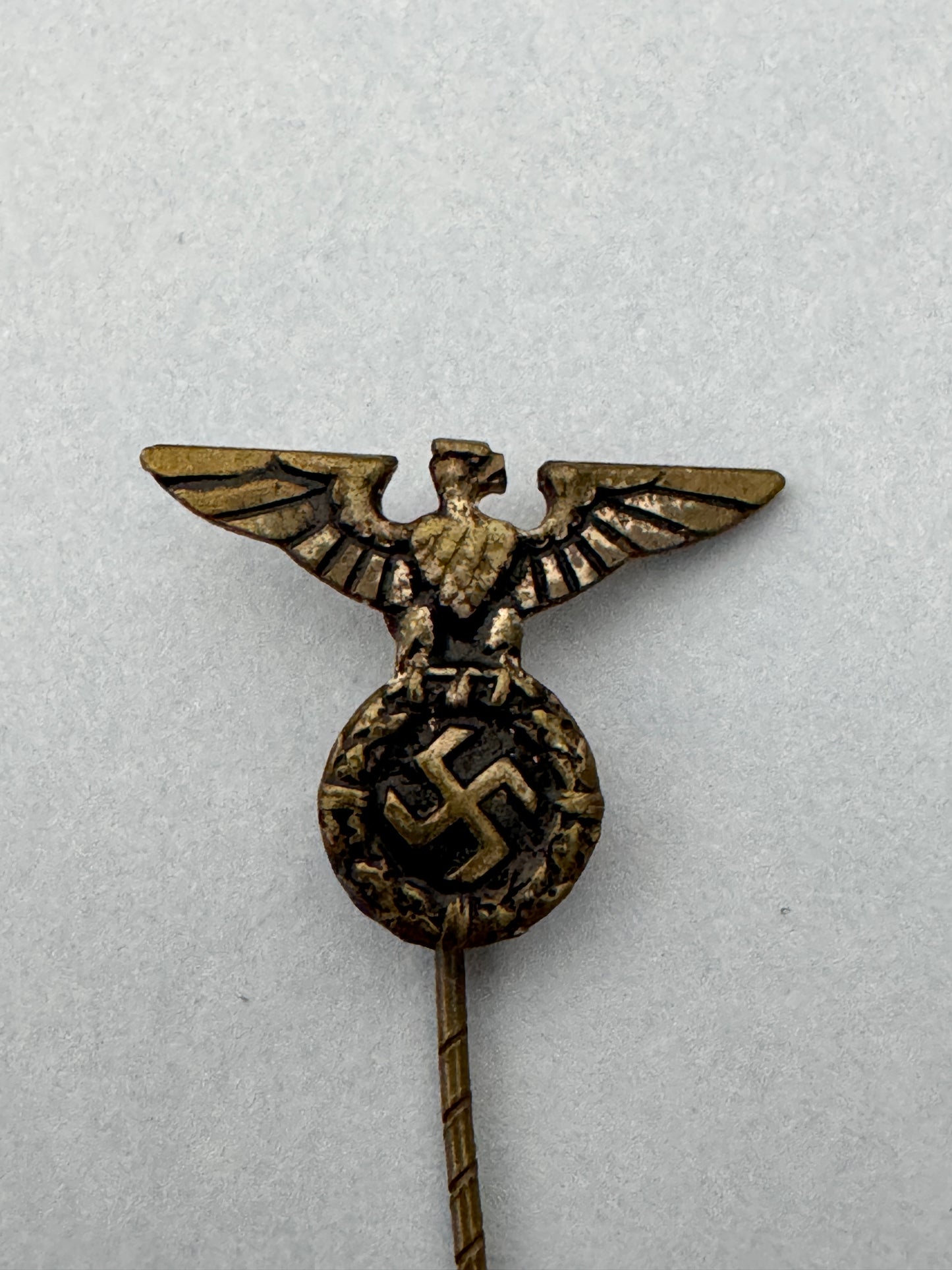 WW2 German Panzer Assault Badge & Other Stickpins – A trio of original stickpin miniature badges. A Panzer Assault Badge i...