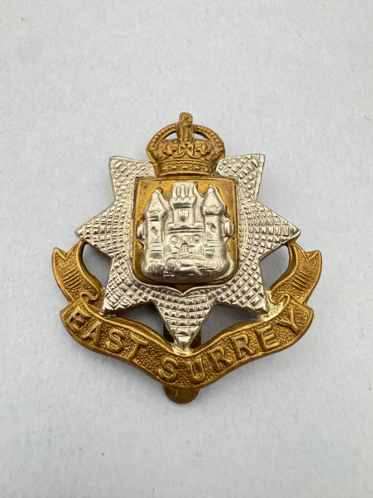 WW1 British Army East Surrey Regiment Cap Badge