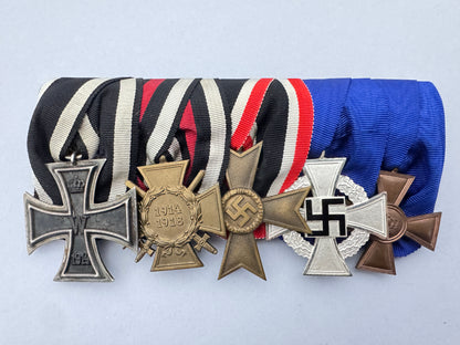 WW2 German War Merit Medal Bar of a WW1 Combat Veteran – An original and extremely fine medal bar of a German Army veteran...