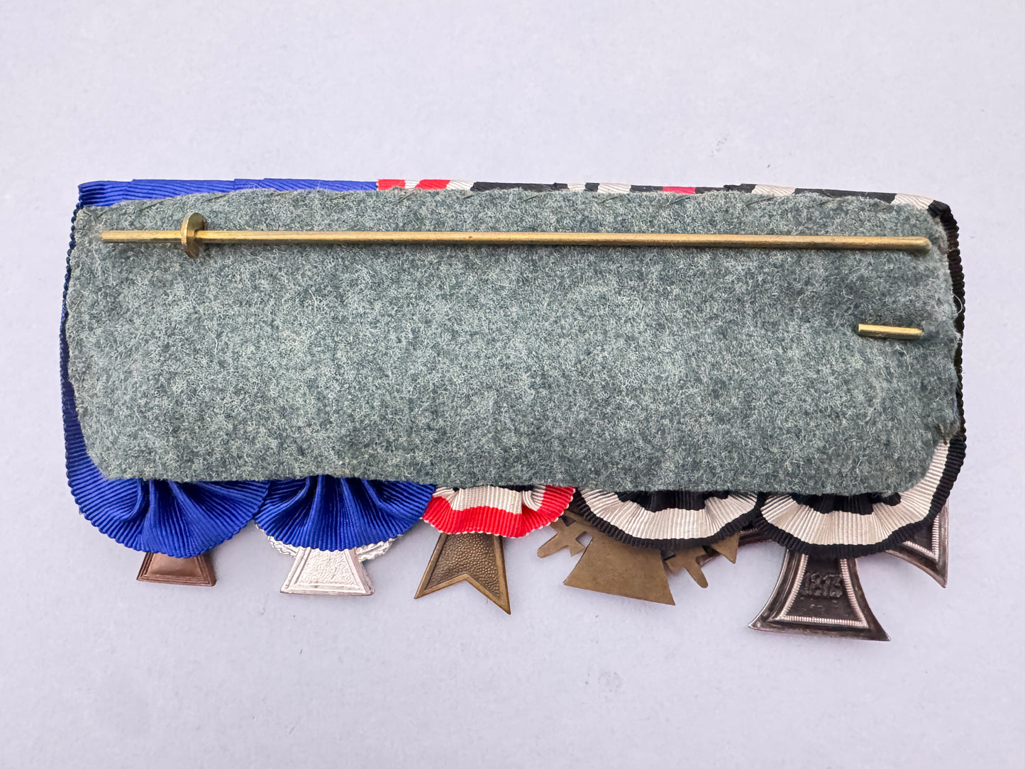 WW2 German War Merit Medal Bar of a WW1 Combat Veteran – An original and extremely fine medal bar of a German Army veteran...