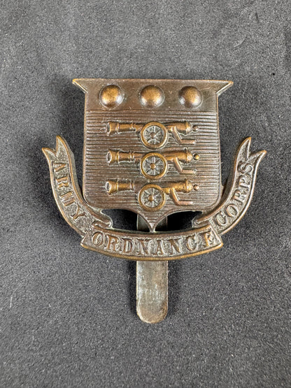 Photo 1 of WW1 British Army Ordnance Corps Cap Badge AOC - collectible militaria item