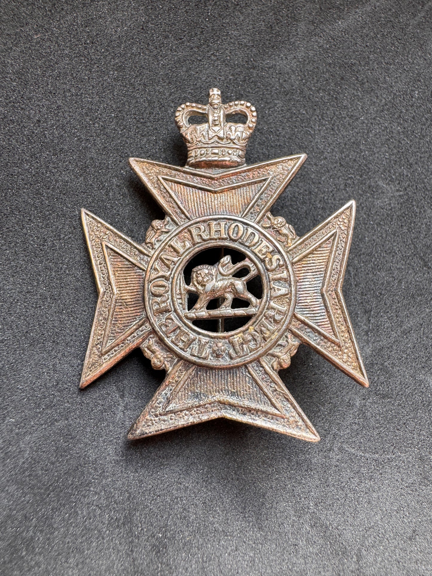 Photo 1 of After WW2 Royal Rhodesian Regiment Cap Badge - collectible militaria item