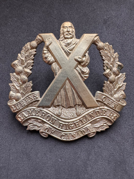 Photo 1 of WW2 Canadian Army Queen's Own Cameron Highlanders of Canada Cap Badge - collectible militaria item