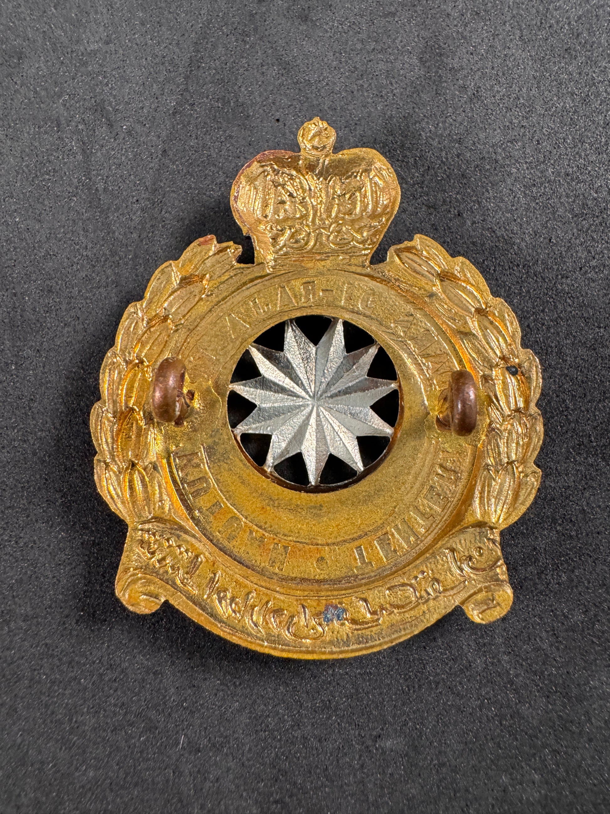 Photo 2 of Royal Malaysian Air Force Police Cap Badge - TUDM Enforcement Branch - collectible militaria item