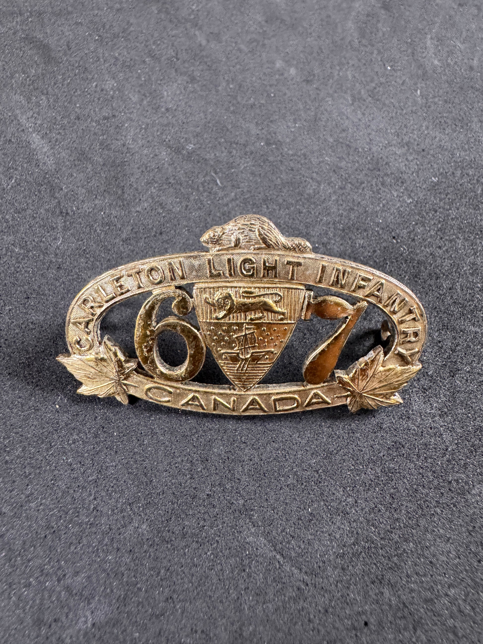 Photo 1 of WWI Canadian Army 67th Carleton Light Infantry Collar Badge - collectible militaria item