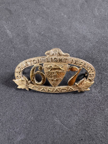 Photo 1 of WWI Canadian Army 67th Carleton Light Infantry Collar Badge - collectible militaria item