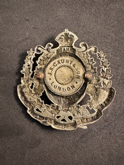Photo 2 of Canadian North West Mounted Police Cap Badge - J.R. Gaunt London - collectible militaria item