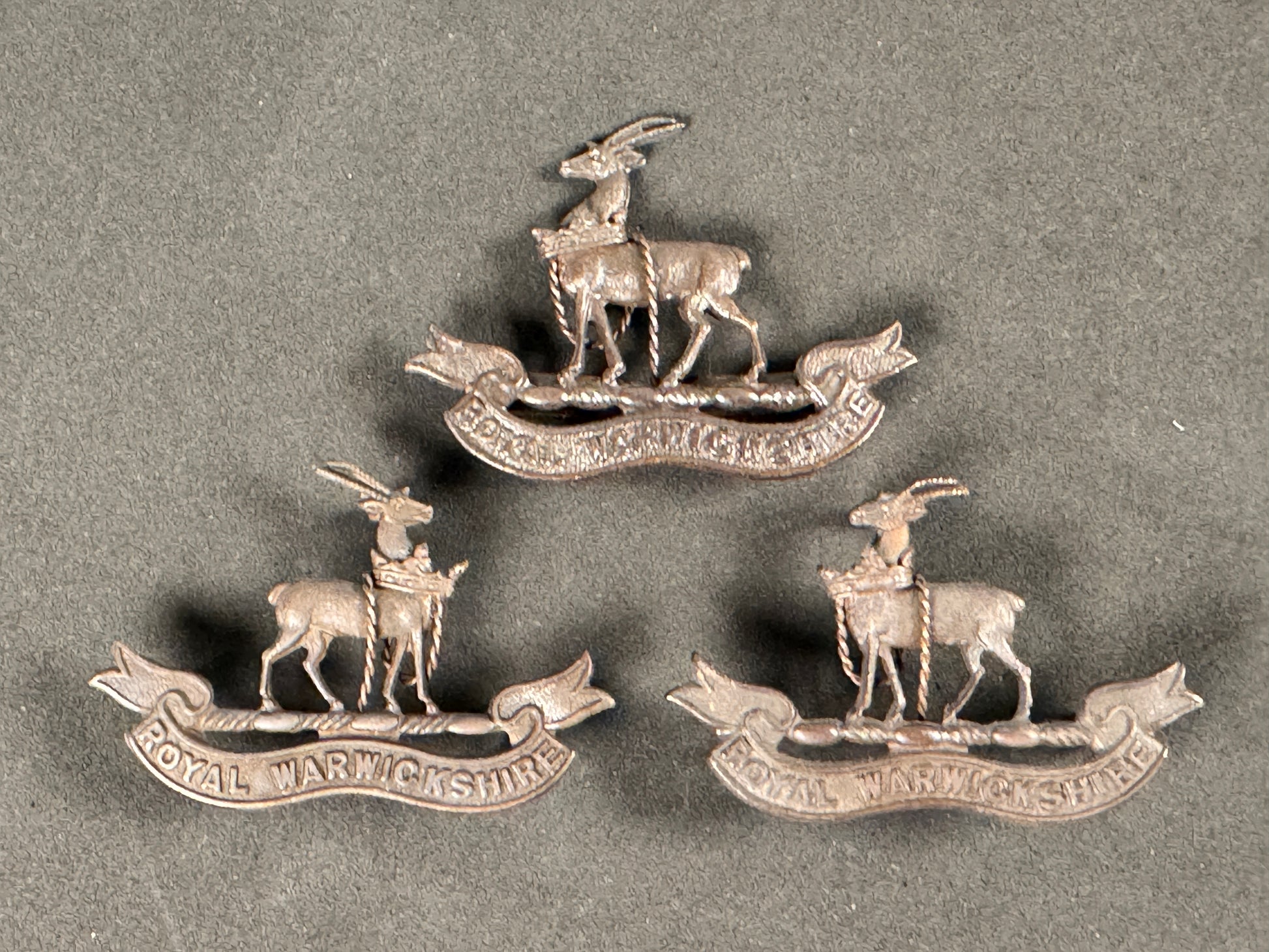 Photo 1 of WW1 Royal Warwickshire Regiment Officer's Cap Badge & Collar Badges - collectible militaria item