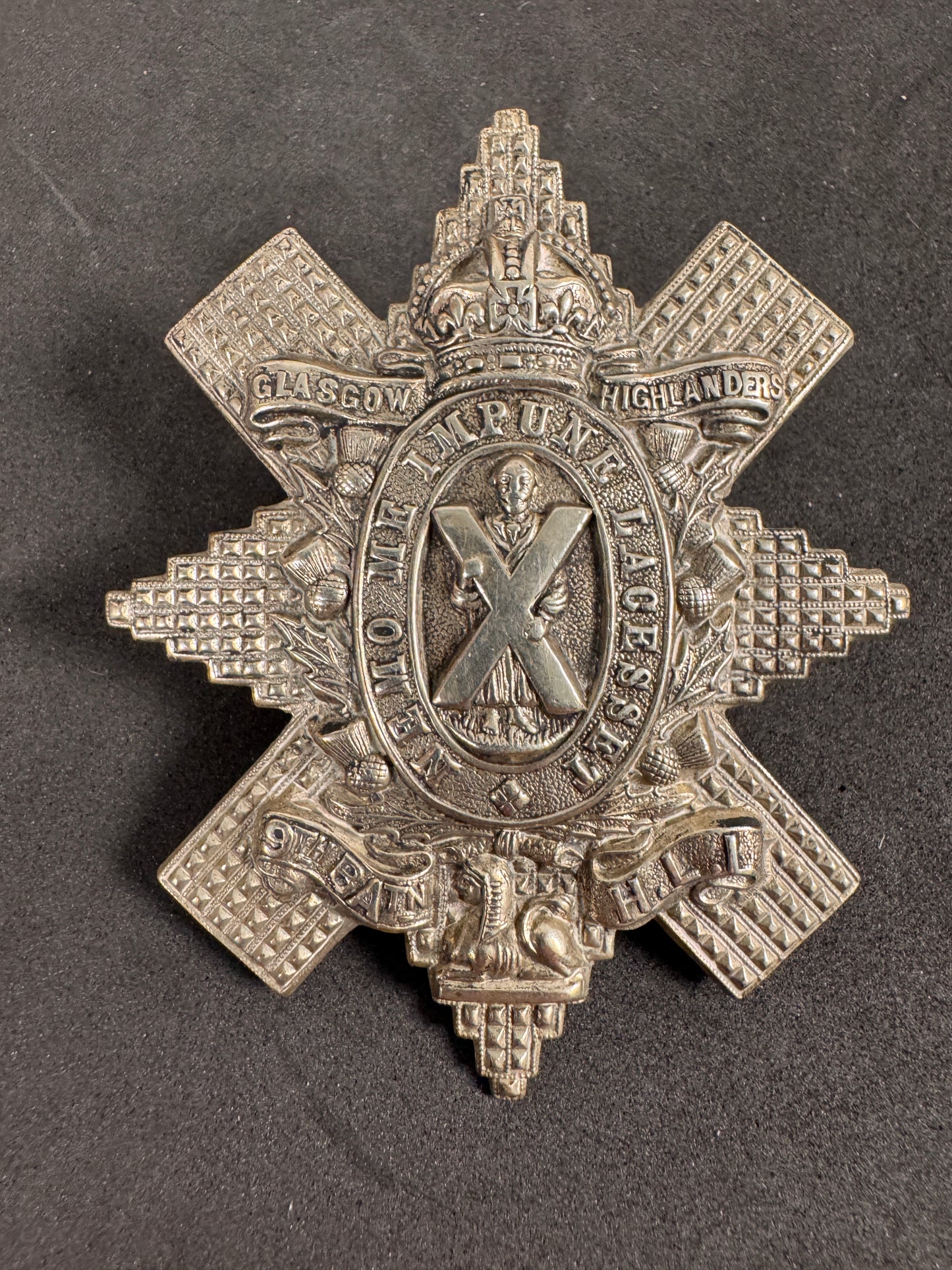 Photo 1 of WW1 British Army 9th Battalion Glasgow Highlanders Cap Badge - collectible militaria item