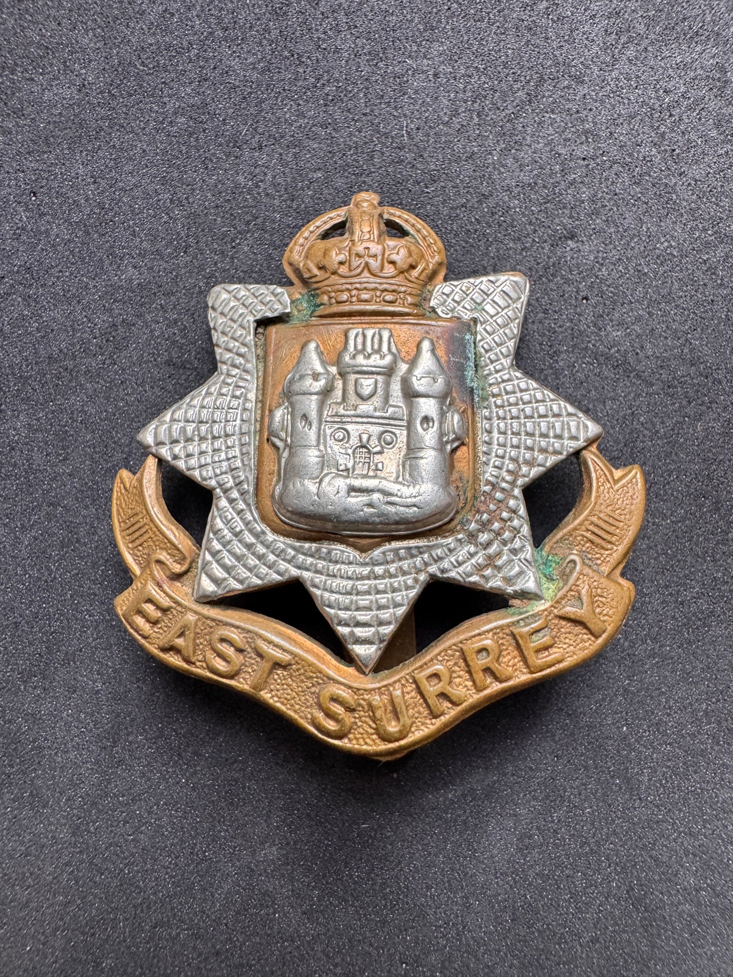 Photo 1 of WW1 British Army East Surrey Regiment Cap Badge - collectible militaria item