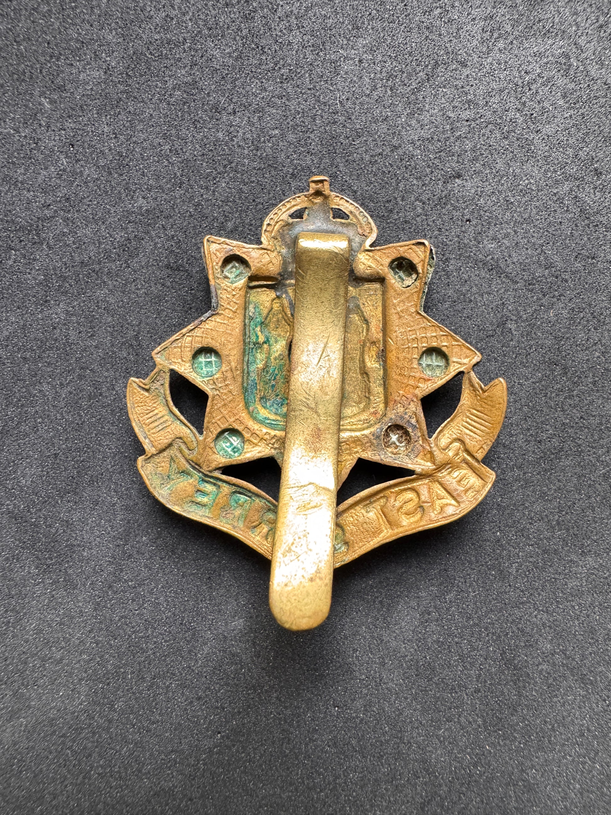 Photo 2 of WW1 British Army East Surrey Regiment Cap Badge - collectible militaria item