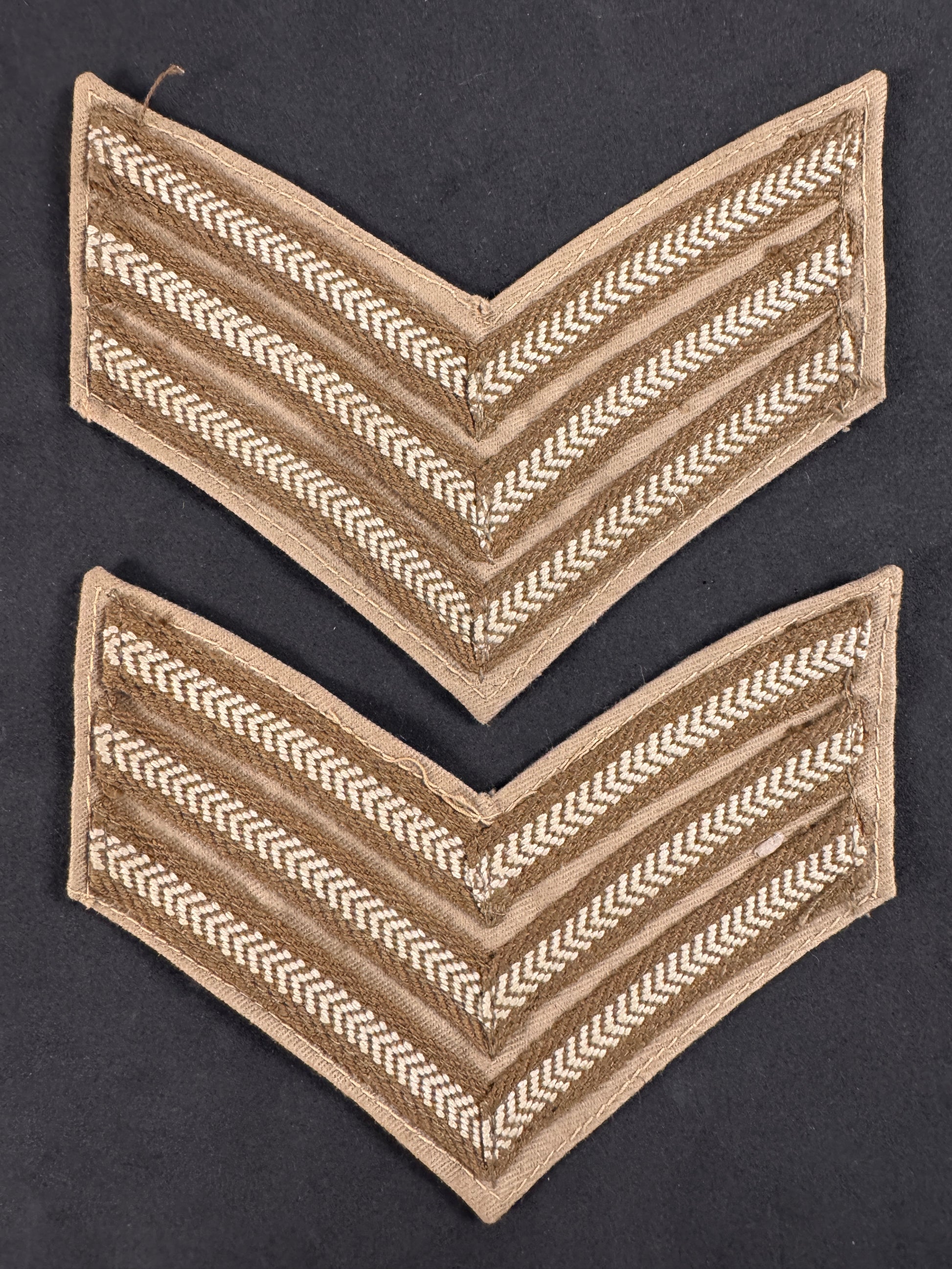 Photo 1 of WW2 British Army Sergeant's Overseas/Tropical Rank Chevrons (Pair) - collectible militaria item