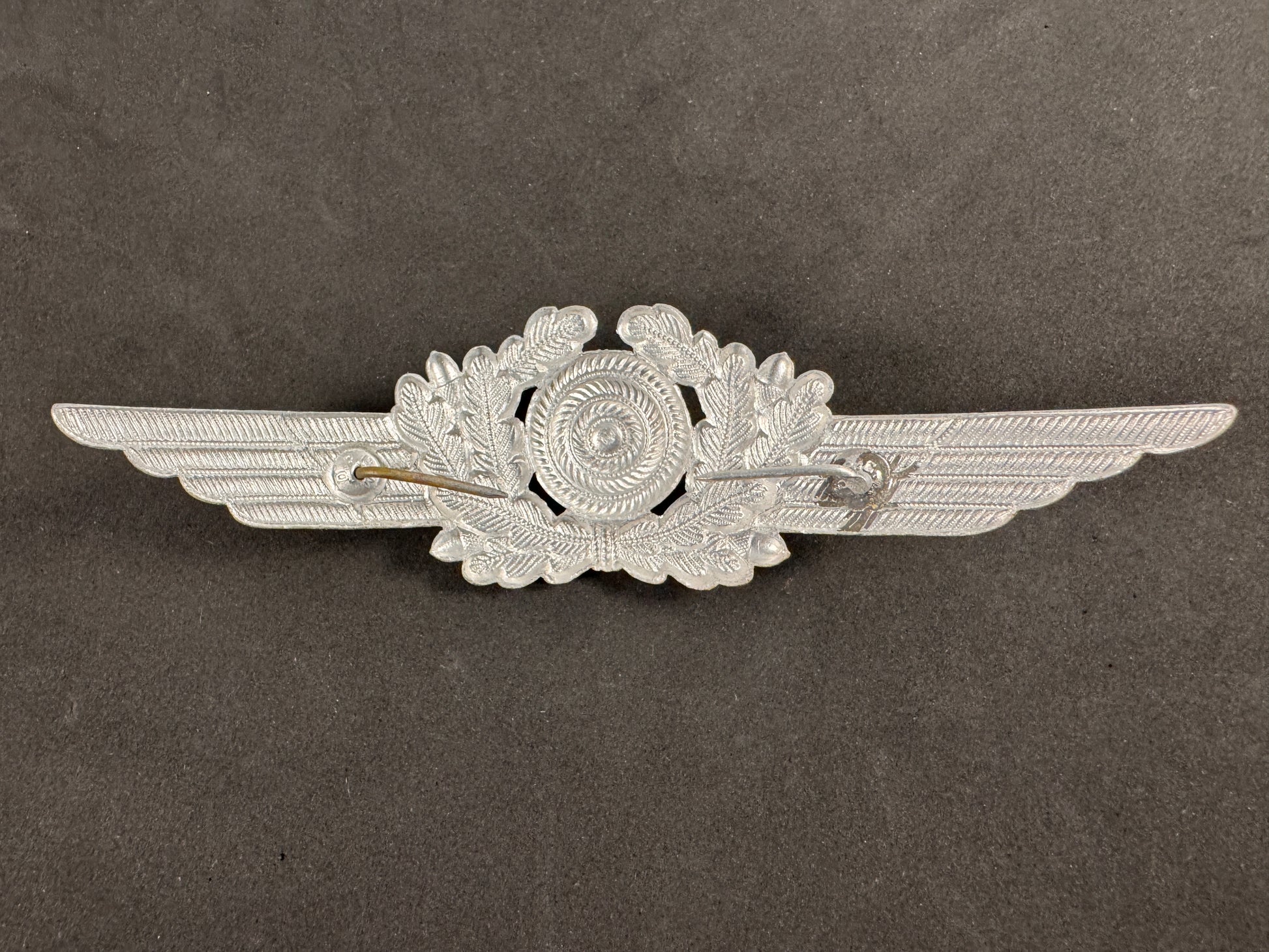 Photo 2 of WW2 German Luftwaffe EM/NCO Visor Cap Cockade Wreath - DRGM - collectible militaria item