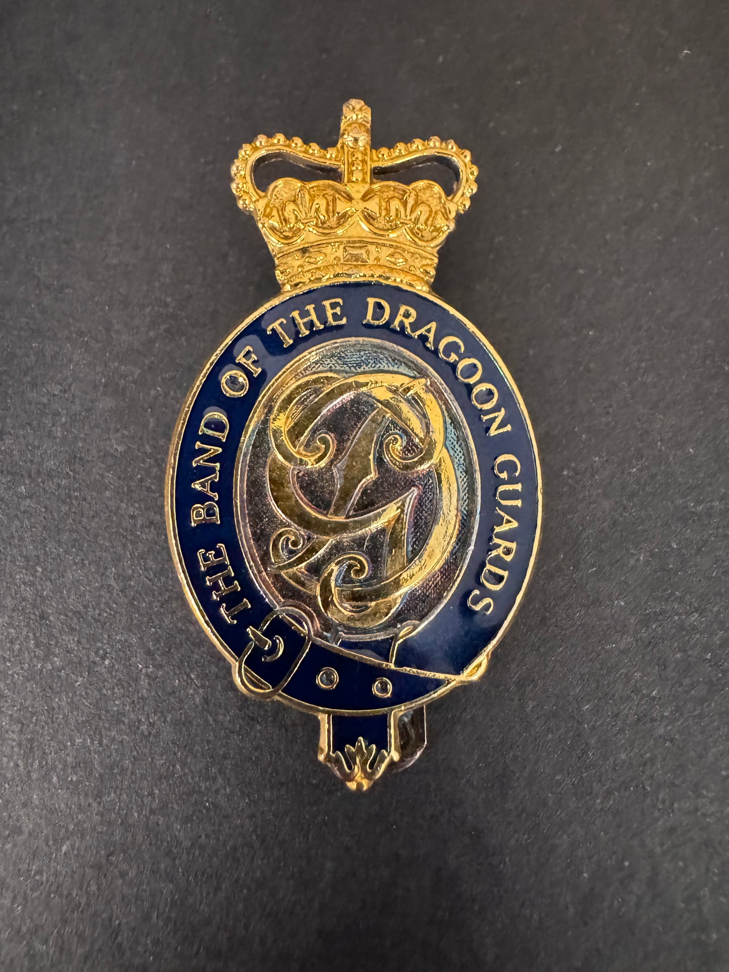 Photo 1 of The Band of The Dragoon Guards Cap Badge - collectible militaria item